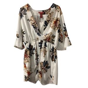 Flower pint short romper. New with tags